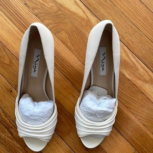 Nina Chezare-LS ivory luster satin size 9.5 Never Worn